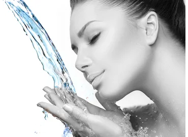 Woman with clear water fountain